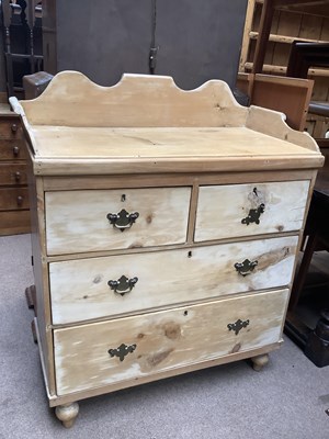 Lot 2386 - An old pine chest, with shaped back above two...