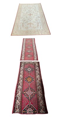 Lot 2523 - Three decorative rugs