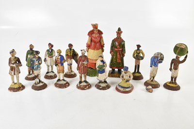 Lot 2539 - A collection of Indian plaster figures,...