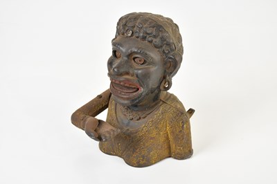 Lot 2595 - DINAH; a cast iron money bank.