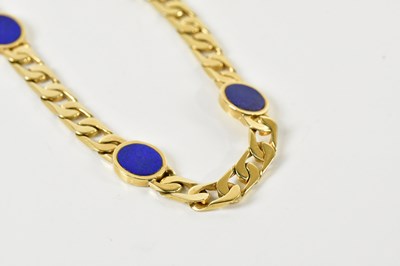 Lot 1537 - A yellow metal curb link and lapis lazuli set...