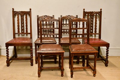 Lot 2382 - A set of six Edwardian carved oak dining...