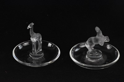 Lot 2831 - LALIQUE; two pin dishes, one modelled as a...