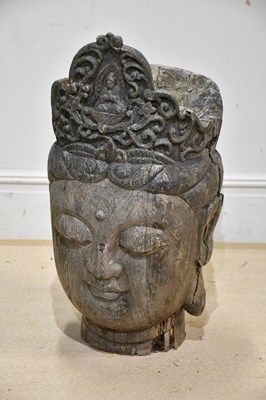 Lot 2853 - A large carved wood bust of Guanyin, height 76cm.
