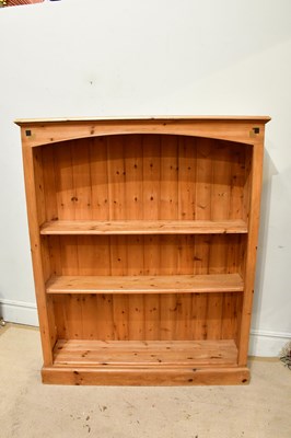 Lot 2277 - A pine bookcase with adjustable shelves,...