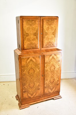 Lot 2202 - An Art Deco burr walnut cocktail cabinet, the...