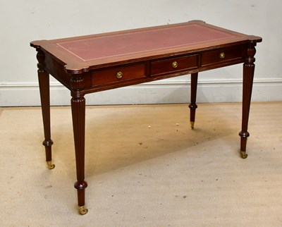Lot 2457 - A Regency style writing table with red leather...