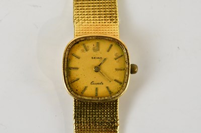 Lot 1830 - SEIKO; a lady's 18ct yellow gold quartz...