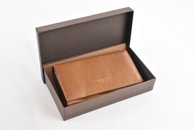 Lot 1943 - THE BRIDGE; a tan pebbled leather wallet and...