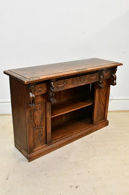 Lot 2311 - An early 20th century oak carved bookcase,...