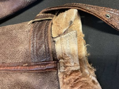 Lot 86 - A vintage sheepskin flying jacket. Proceeds to...