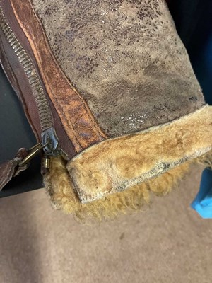 Lot 86 - A vintage sheepskin flying jacket. Proceeds to...
