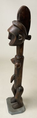 Lot 80 - A 20th century carved African tribal figure of...
