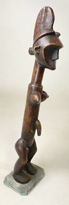 Lot 80 - A 20th century carved African tribal figure of...