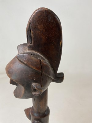 Lot 80 - A 20th century carved African tribal figure of...