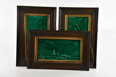 Lot 2777 - A group of three green glazed Majolica tiles,...