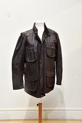 Lot 1976 - BARBOUR; a gentleman's brown waxed jacket with...