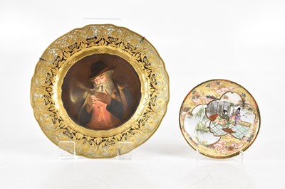 Lot 673 - A late 19th century hand-painted cabinet plate...