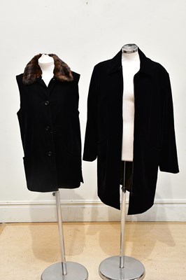 Lot 750 - HARRODS; a black velvet knee length lined coat,...