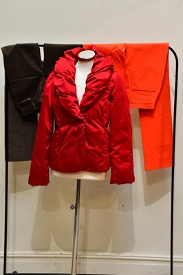 Lot 2001 - RALPH LAUREN; a short red satin quilted jacket,...