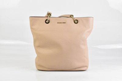 Lot 2050 - MICHAEL KORS; an unused nude pink pebbled...