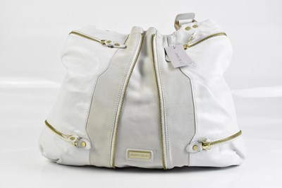 Lot 2045 - JIMMY CHOO; a cream leather and suede unused...