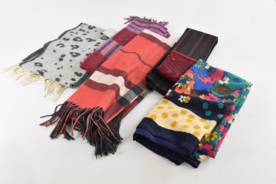 Lot 1941 - KENZO; a 100% wool multicoloured scarf...