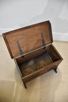 Lot 2281 - A small oak coffer, with hinged lid and carved...