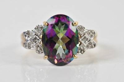 Lot 1494 - A 9ct yellow gold mystic topaz dress ring,...