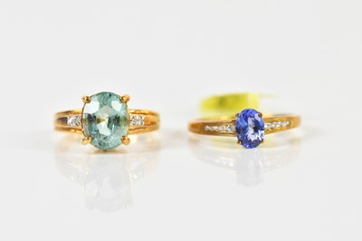 Lot 1491 - An 18ct yellow gold dress ring, with Paraiba...