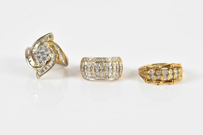 Lot 1404 - Three 9ct yellow gold diamond set dress rings,...