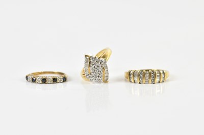 Lot 1415 - Three 9ct yellow gold diamond set dress rings,...