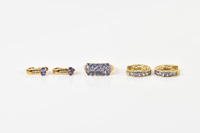 Lot 1687 - A pair of 18ct yellow gold tanzanite earrings,...