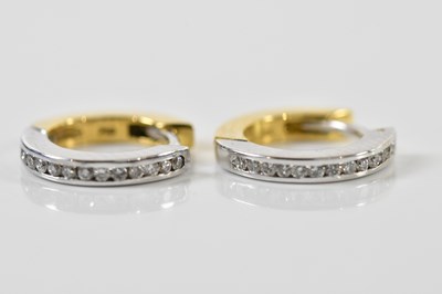 Lot 1688 - A pair of 18ct yellow and white gold diamond...
