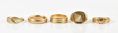 Lot 1329 - Five 9ct yellow gold rings, combined approx 24....