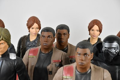 Lot 21 - STAR WARS; a collection of figures, including...