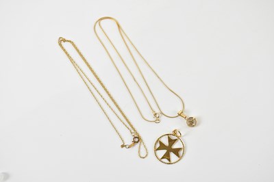 Lot 1638 - A 14ct yellow gold chain suspending a yellow...