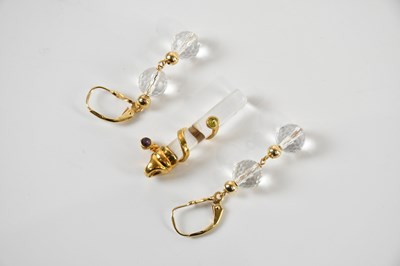 Lot 1227 - URI GELLER; a 9ct yellow gold crystal mounted...