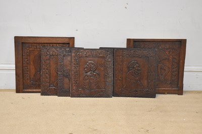 Lot 2504 - Seven carved oak panels, decorated with...