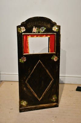 Lot 2521 - A painted and printed wooden triptych puppet...