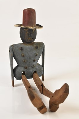 Lot 2568 - An unusual, probably Dutch, wooden peg doll of...