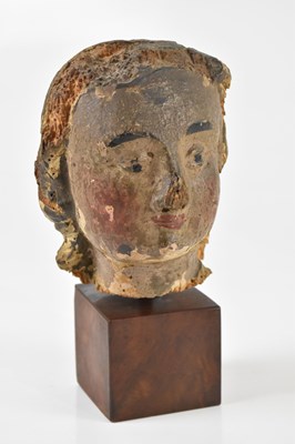 Lot 2506 - A 16th century carved wooden girls head,...