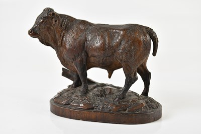 Lot 2591 - A Black Forest style bull, on oval base,...