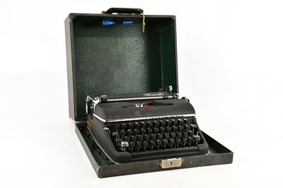 Lot 2543 - OLYMPIA; a cased typewriter.