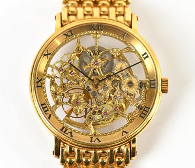 Lot 1821 - A yellow metal cased wristwatch, the skeleton...