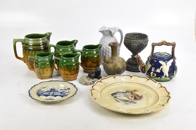 Lot 650 - A Victorian majolica teapot, relief decorated...