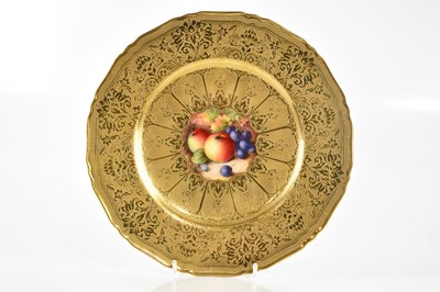 Lot 2738 - ROYAL WORCESTER; a hand painted and gilt...