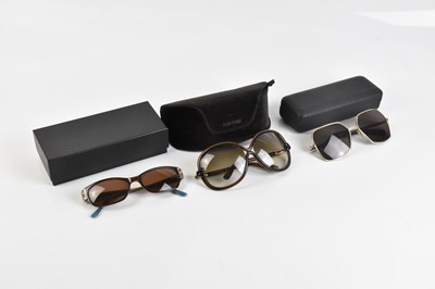 Lot 693 - TOM FORD; a pair of brown rimmed sunglasses...