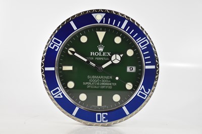 Lot 2487 - A 'Rolex' dealer's display wall clock modelled...