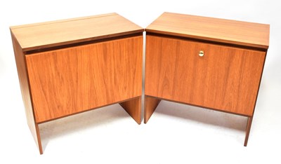 Lot 22 - MEREDEW; two piece teak units, one with...